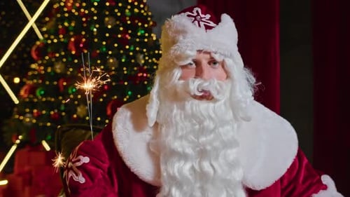 Santa Claus Holding Sparkler by Christmas Tree