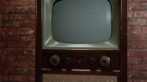 Antique Television Set - Tilt up reveal old 1950s era TV