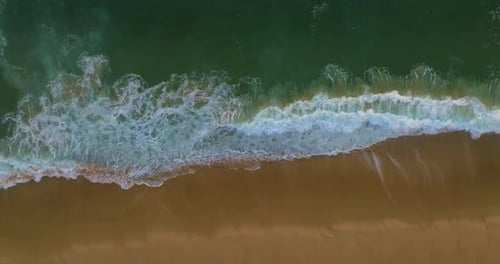 Aerial View on Turquiose Sea Waves Breaking on Sandy Coastline Top Down View on Blue Turquoise Ocean