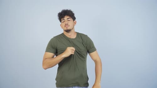 Man Demonstrating Cooling off on Plain Background