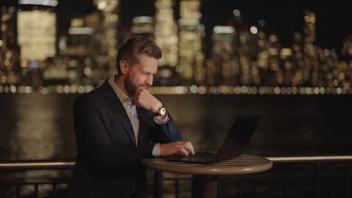 Overworked Business Man on Night City Overworked Man Work on Laptop Outdoor Business Man in Night