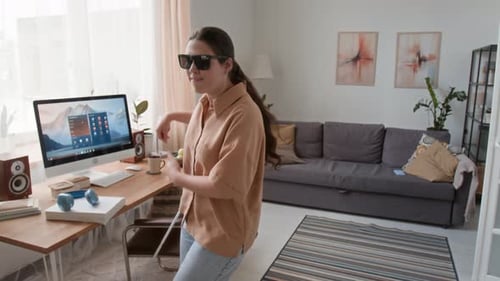 Positive Young Woman with Visual Impairment Making Dance Moves at Home
