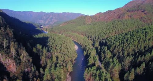 Low Altitude Flight Over Fresh Fast Mountain River with Rocks at Sunny Summer Morning