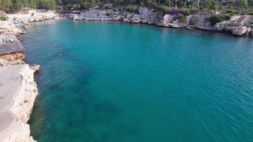 Aerial View of People Swimming in Lagoon