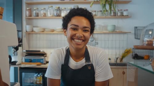 Employees working in a nordic styled cafe.