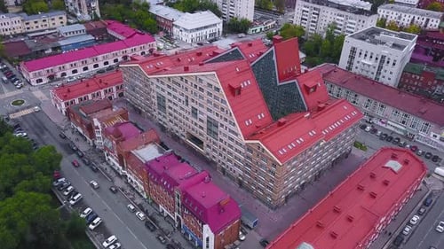Modern Building with Red Roof in City Center
