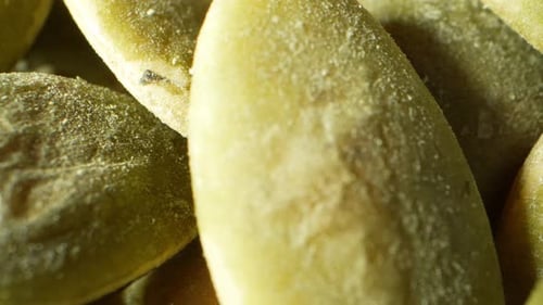 Green pumpkin kernels, through the probe lens.