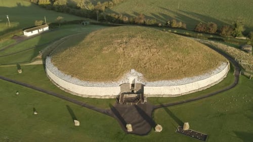 Newgrange At Bru na Boinne, Renowned Prehistoric Monument At County Meath in Ireland. - aerial shot