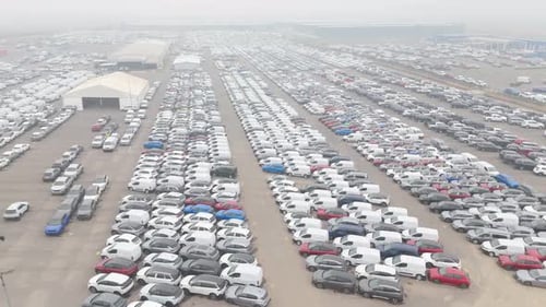 Fleet of white vehicles, parked in the commune of Pudahuel, metropolitan region, country of Chile