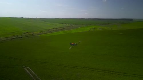 Spray Fertilize On Field With Chemicals In Agriculture Field