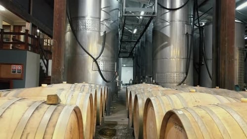 Row Of Tanks And Barrels In Brewery Warehouse - handheld