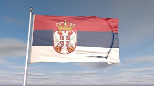 Realistic Waving Flag of Serbia against Blue Sky