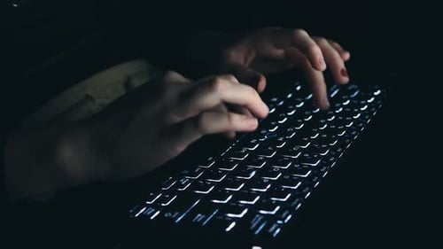 Hand Typing on Keyboard