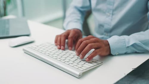 Man, hands and keyboard for web design in office, typing and online for programming code