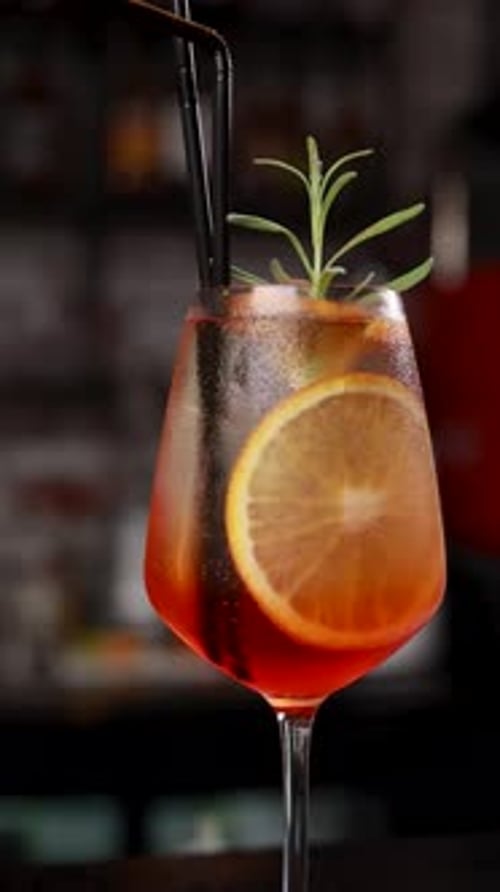 the bartender prepares a cocktail at the bar
