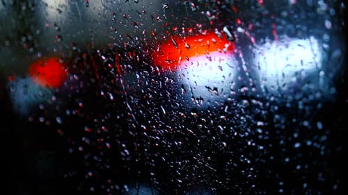 The Concept of Transportation on the Night Autumn City Road in Heavy