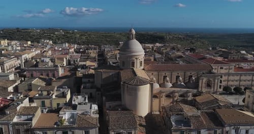 Aerial view of city and church, Italy.