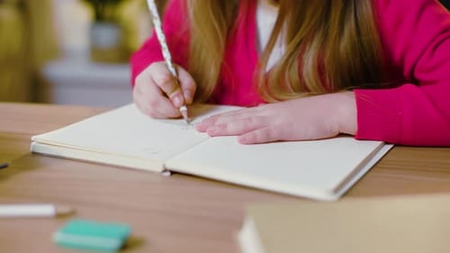 Close Up Child Girl Sitting Near Table Have Homework Education and Learning Concept at Home Writing