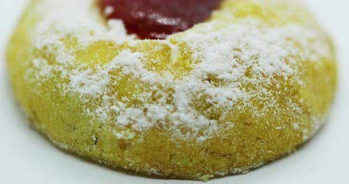 Close-up close up slide up move view of Christmas cookies in the form of a wheel decorated with suga