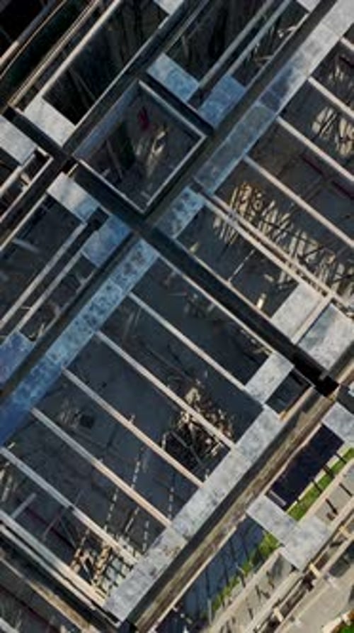 Vertical Drone Shot Top View Construction Layout with Repetitive Structural Patterns