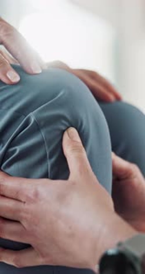 Hands, knee pain and physiotherapy with people in clinic for healthcare, medical or rehabilitation