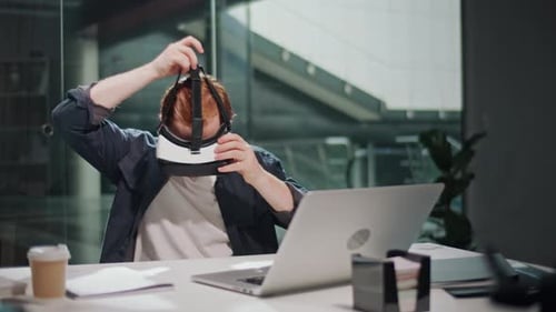 Futuristic Workflow Man Uses 3D Augmented Reality Glasses in Modern Office