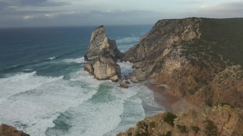 Portugal, Lisbon District, Cliffs surrounding Praia da Ursa beach