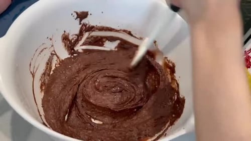 Mixing Chocolate Batter in Bowl with Spatula