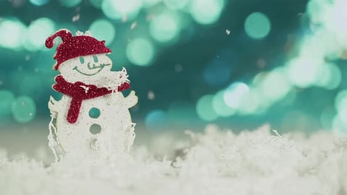 Snowman Ornament in Winter with Falling Snow