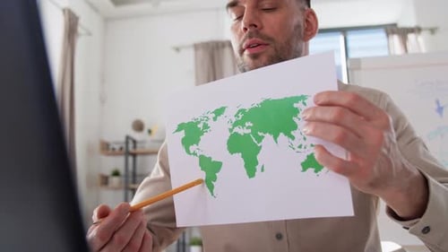 Distance Education, School and Remote Job Concept - Male Geography Teacher With