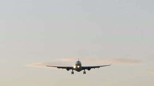 Commercial Airplane Jet Plane Landing at Airport After Flight Trip
