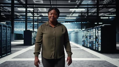 Software Developer Walking in Data Center Checking Hardware