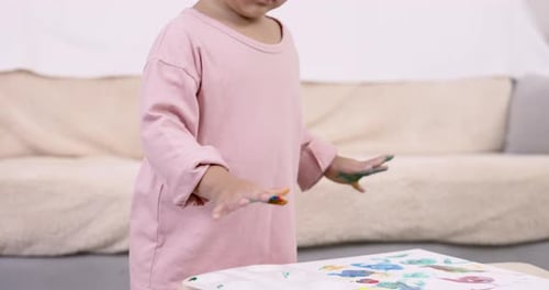 Cute Child Finger Painting Colorful Picture Indoors