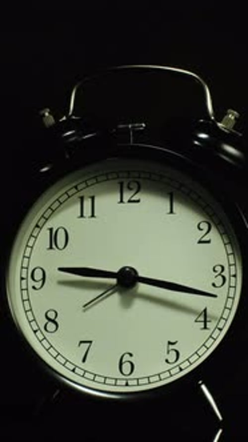 Vintage Alarm Clock Showing Time Passing