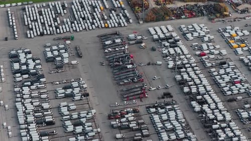 Aerial view of vehicles parked in rows, Italy.
