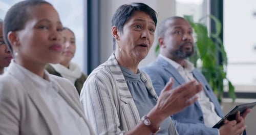 Diverse Business People Attending a Corporate Meeting
