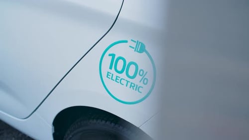 Electric Car with 100 Percent Electric Sign
