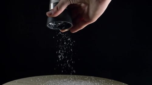 Salt Mill on a Black Background