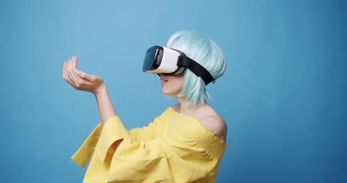 Woman Wearing VR Goggles Exploring Futuristic Technology