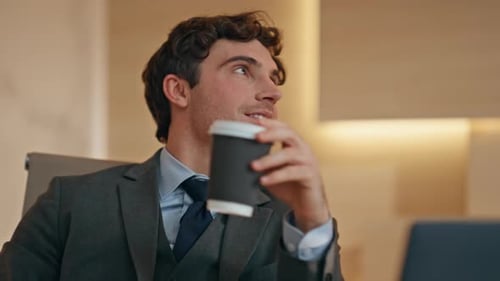 Resting Man Drinking Coffee at Evening Office Closeup Partners Talking Flirting