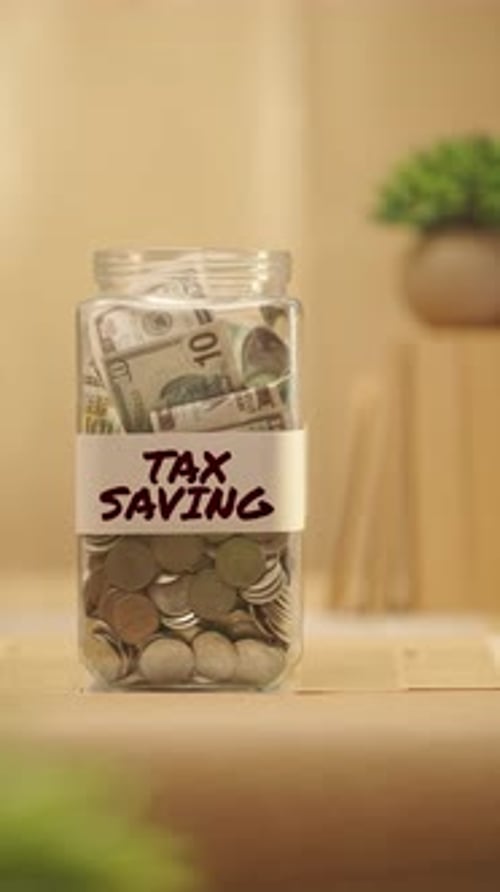 Tax Savings Jar Filled with Money