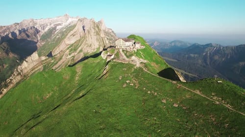 Alpine Refuge: Aerial of Schaefler Hut on a Verdant Swiss Ridge