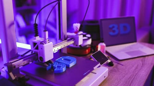 3D Printer Creating Blue Objects