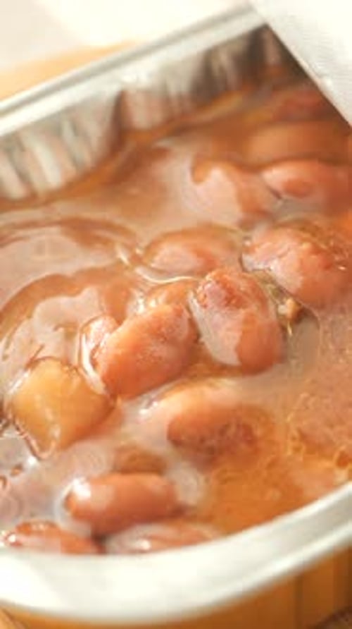 Delicious Beans in Sauce on a Spoon