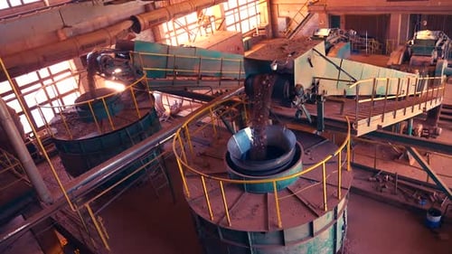 Industrial Machinery Processing Materials in Factory Environment