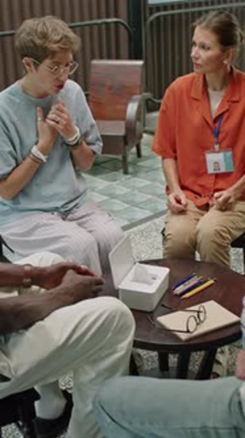 Distraught Woman Receives Support in Group Discussion