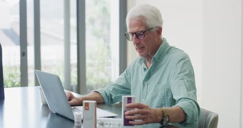 Senior Man Video Calling Doctor About Medication