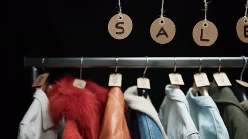 Clothes for Sale in a Shop for Black Friday