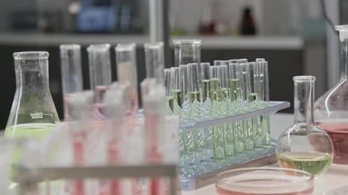 Close-up of Various Sized Flasks and Test Tubes in Sterile Scientific Laboratory
