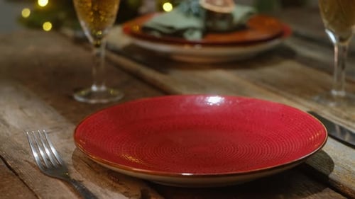 Christmas table setting with festive holiday decorations